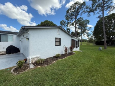 Location! Location! This is a must see home!!   This beautifully on Del Tura Golf and Country Club in Florida - for sale on GolfHomes.com, golf home, golf lot