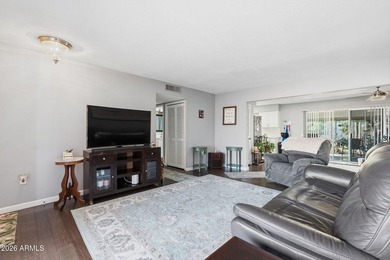 Located in the heart of Sun City, residents enjoy access to 7 on Sun City Lakes West and East in Arizona - for sale on GolfHomes.com, golf home, golf lot