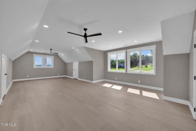 This exquisite gem nestled in the prestigious Ridges subdivision on Ridges Golf and Country Club in Tennessee - for sale on GolfHomes.com, golf home, golf lot