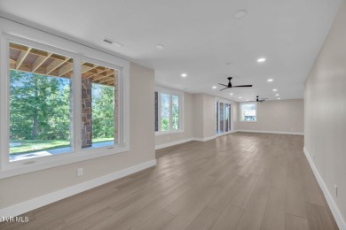 This exquisite gem nestled in the prestigious Ridges subdivision on Ridges Golf and Country Club in Tennessee - for sale on GolfHomes.com, golf home, golf lot