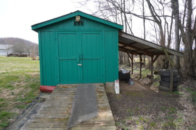 Main-Level Living with Mountain Views & Incredible Storage on Smoky Mountain Country Club in Tennessee - for sale on GolfHomes.com, golf home, golf lot