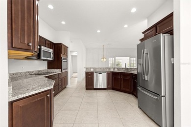 *LARGE GLASS ENCLOSED BONUS ROOM*FANTASTIC LOCATION*GOLF CART on Bella Glade Country Club in Florida - for sale on GolfHomes.com, golf home, golf lot