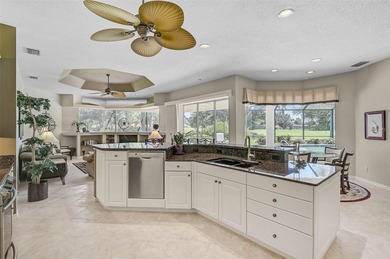 Discover refined living in this expansive Calusa Lakes estate on Calusa Lakes Golf Club in Florida - for sale on GolfHomes.com, golf home, golf lot