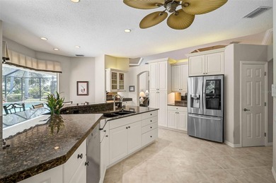 Discover refined living in this expansive Calusa Lakes estate on Calusa Lakes Golf Club in Florida - for sale on GolfHomes.com, golf home, golf lot