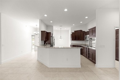 *LARGE GLASS ENCLOSED BONUS ROOM*FANTASTIC LOCATION*GOLF CART on Bella Glade Country Club in Florida - for sale on GolfHomes.com, golf home, golf lot