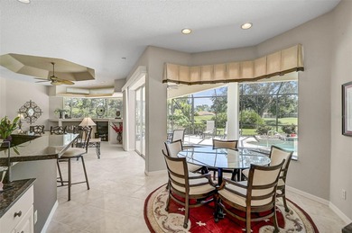 Discover refined living in this expansive Calusa Lakes estate on Calusa Lakes Golf Club in Florida - for sale on GolfHomes.com, golf home, golf lot