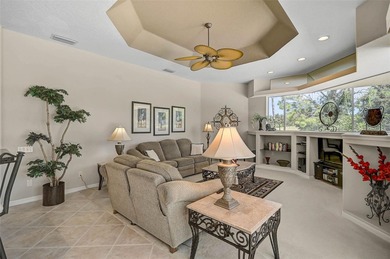 Discover refined living in this expansive Calusa Lakes estate on Calusa Lakes Golf Club in Florida - for sale on GolfHomes.com, golf home, golf lot