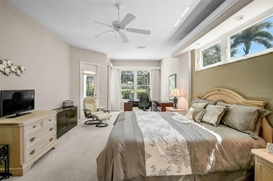 Discover refined living in this expansive Calusa Lakes estate on Calusa Lakes Golf Club in Florida - for sale on GolfHomes.com, golf home, golf lot