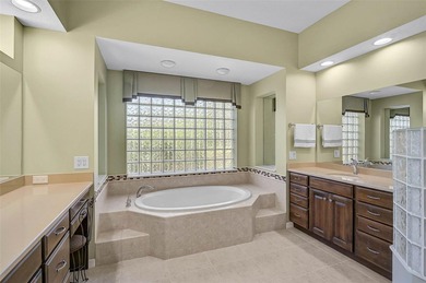 Discover refined living in this expansive Calusa Lakes estate on Calusa Lakes Golf Club in Florida - for sale on GolfHomes.com, golf home, golf lot