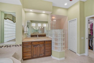 Discover refined living in this expansive Calusa Lakes estate on Calusa Lakes Golf Club in Florida - for sale on GolfHomes.com, golf home, golf lot