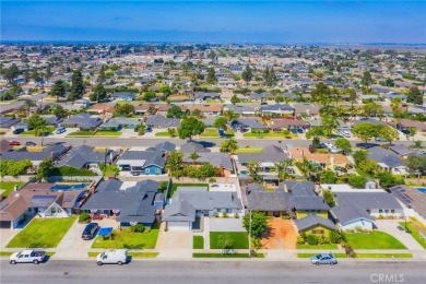 Set in the tranquil Bolsa Chica-Heil neighborhood of Huntington on Meadowlark Golf Club in California - for sale on GolfHomes.com, golf home, golf lot