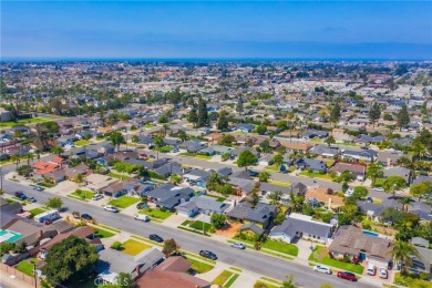 Set in the tranquil Bolsa Chica-Heil neighborhood of Huntington on Meadowlark Golf Club in California - for sale on GolfHomes.com, golf home, golf lot