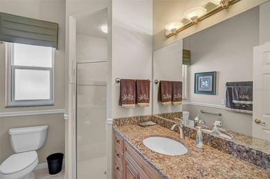 Discover refined living in this expansive Calusa Lakes estate on Calusa Lakes Golf Club in Florida - for sale on GolfHomes.com, golf home, golf lot