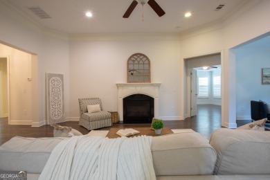 Enjoy the perfect balance of comfort and connection in this on Lanier Island Legacy Golf Couorse in Georgia - for sale on GolfHomes.com, golf home, golf lot