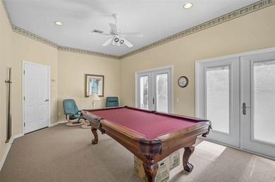 Discover refined living in this expansive Calusa Lakes estate on Calusa Lakes Golf Club in Florida - for sale on GolfHomes.com, golf home, golf lot