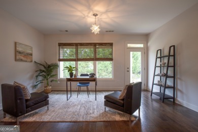 Enjoy the perfect balance of comfort and connection in this on Lanier Island Legacy Golf Couorse in Georgia - for sale on GolfHomes.com, golf home, golf lot