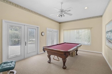Discover refined living in this expansive Calusa Lakes estate on Calusa Lakes Golf Club in Florida - for sale on GolfHomes.com, golf home, golf lot