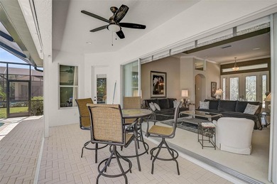 Discover refined living in this expansive Calusa Lakes estate on Calusa Lakes Golf Club in Florida - for sale on GolfHomes.com, golf home, golf lot