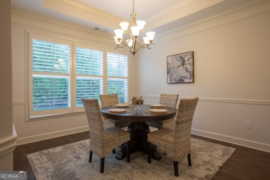 Enjoy the perfect balance of comfort and connection in this on Lanier Island Legacy Golf Couorse in Georgia - for sale on GolfHomes.com, golf home, golf lot