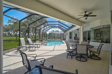 Discover refined living in this expansive Calusa Lakes estate on Calusa Lakes Golf Club in Florida - for sale on GolfHomes.com, golf home, golf lot