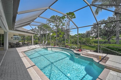 Discover refined living in this expansive Calusa Lakes estate on Calusa Lakes Golf Club in Florida - for sale on GolfHomes.com, golf home, golf lot