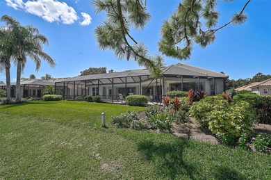 Discover refined living in this expansive Calusa Lakes estate on Calusa Lakes Golf Club in Florida - for sale on GolfHomes.com, golf home, golf lot