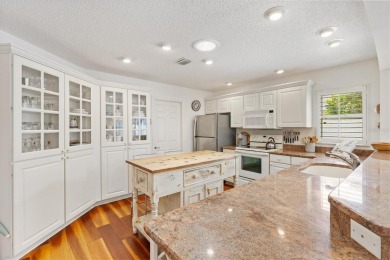 Courtyard Villa with a STRETCHED 2-CAR GARAGE offered TURN-KEY on The Links of Spruce Creek in Florida - for sale on GolfHomes.com, golf home, golf lot