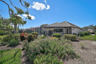 Discover refined living in this expansive Calusa Lakes estate on Calusa Lakes Golf Club in Florida - for sale on GolfHomes.com, golf home, golf lot