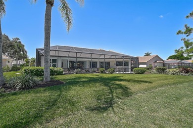 Discover refined living in this expansive Calusa Lakes estate on Calusa Lakes Golf Club in Florida - for sale on GolfHomes.com, golf home, golf lot
