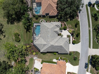 Discover refined living in this expansive Calusa Lakes estate on Calusa Lakes Golf Club in Florida - for sale on GolfHomes.com, golf home, golf lot