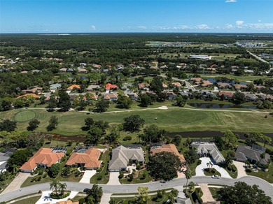 Discover refined living in this expansive Calusa Lakes estate on Calusa Lakes Golf Club in Florida - for sale on GolfHomes.com, golf home, golf lot
