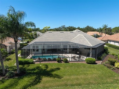 Discover refined living in this expansive Calusa Lakes estate on Calusa Lakes Golf Club in Florida - for sale on GolfHomes.com, golf home, golf lot