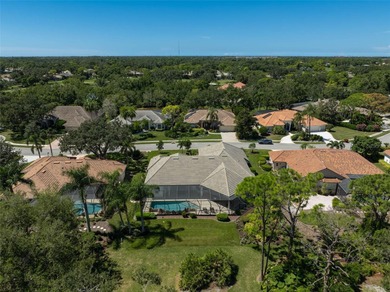 Discover refined living in this expansive Calusa Lakes estate on Calusa Lakes Golf Club in Florida - for sale on GolfHomes.com, golf home, golf lot