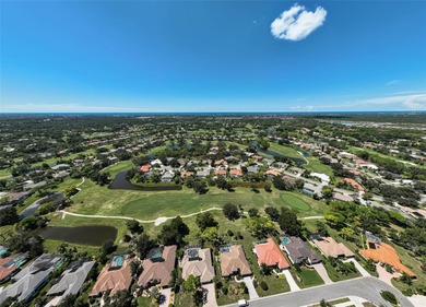 Discover refined living in this expansive Calusa Lakes estate on Calusa Lakes Golf Club in Florida - for sale on GolfHomes.com, golf home, golf lot