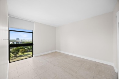 Step into this beautifully remodeled corner unit, where modern on Turnberry Isle Resort and Club in Florida - for sale on GolfHomes.com, golf home, golf lot