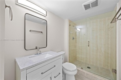 Step into this beautifully remodeled corner unit, where modern on Turnberry Isle Resort and Club in Florida - for sale on GolfHomes.com, golf home, golf lot