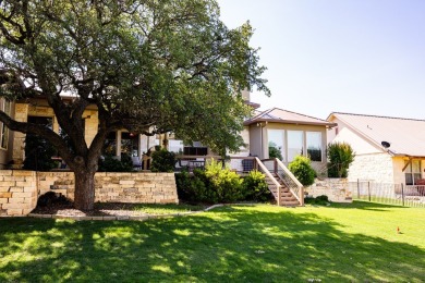 Beautiful single-family home sits overlooking the green of Hole on The Club At Comanche Trace in Texas - for sale on GolfHomes.com, golf home, golf lot
