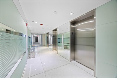 Step into this beautifully remodeled corner unit, where modern on Turnberry Isle Resort and Club in Florida - for sale on GolfHomes.com, golf home, golf lot