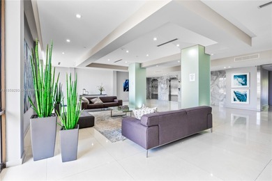 Step into this beautifully remodeled corner unit, where modern on Turnberry Isle Resort and Club in Florida - for sale on GolfHomes.com, golf home, golf lot