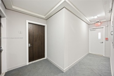 Step into this beautifully remodeled corner unit, where modern on Turnberry Isle Resort and Club in Florida - for sale on GolfHomes.com, golf home, golf lot