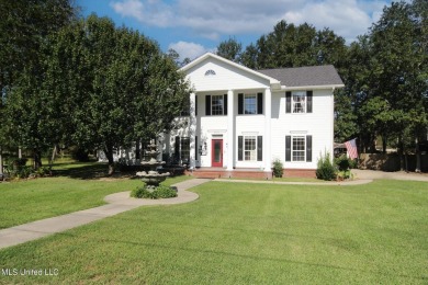 Discover this exquisite 4-bedroom home tucked away in on Diamondhead Country Club in Mississippi - for sale on GolfHomes.com, golf home, golf lot