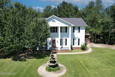 Discover this exquisite 4-bedroom home tucked away in on Diamondhead Country Club in Mississippi - for sale on GolfHomes.com, golf home, golf lot