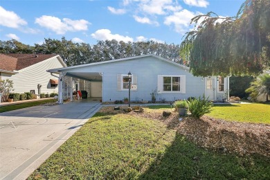 Feel Cozy in this CEDAR KEY model with BOND PAID situated in the on El Diablo Executive Golf Course in Florida - for sale on GolfHomes.com, golf home, golf lot