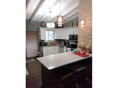 Beautiful home in Lauderdale Golf Estates with an unobstructed on Fort Lauderdale Country Club in Florida - for sale on GolfHomes.com, golf home, golf lot