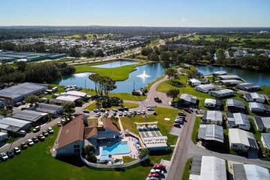 Stunning and updated, this 1,008 sq. ft. (28x36) 1983 Redman on Grasslands Golf and Country Club in Florida - for sale on GolfHomes.com, golf home, golf lot