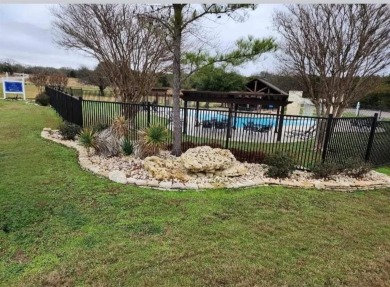 This 0.17-acre lot is adjacent to the new golf course at White on White Bluff Resort - New Course in Texas - for sale on GolfHomes.com, golf home, golf lot