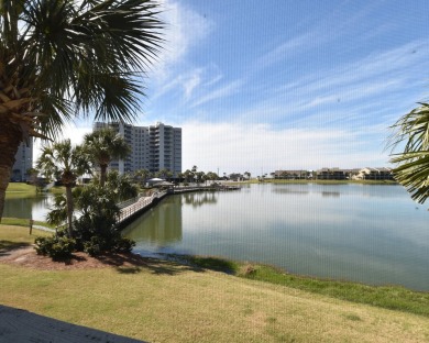 Experience exceptional lakefront living in this exquisitely on Seascape Golf Course in Florida - for sale on GolfHomes.com, golf home, golf lot