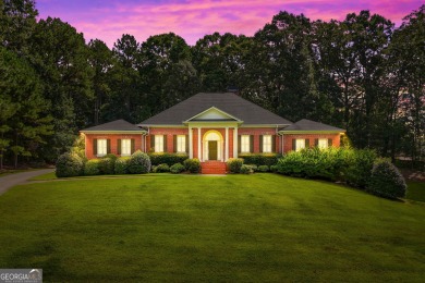 Welcome to this custom-built 4-bedroom, 3 1/2 bath all-brick on Canongate At Georgia National Golf Club in Georgia - for sale on GolfHomes.com, golf home, golf lot