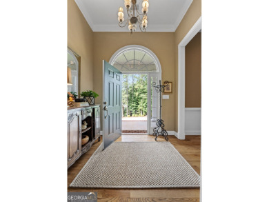 Welcome to this custom-built 4-bedroom, 3 1/2 bath all-brick on Canongate At Georgia National Golf Club in Georgia - for sale on GolfHomes.com, golf home, golf lot