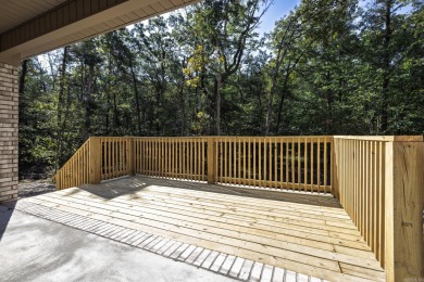 Brand new 1885 square foot home on lovely lot. Trees surround on Ponce De Leon Golf Course in Arkansas - for sale on GolfHomes.com, golf home, golf lot